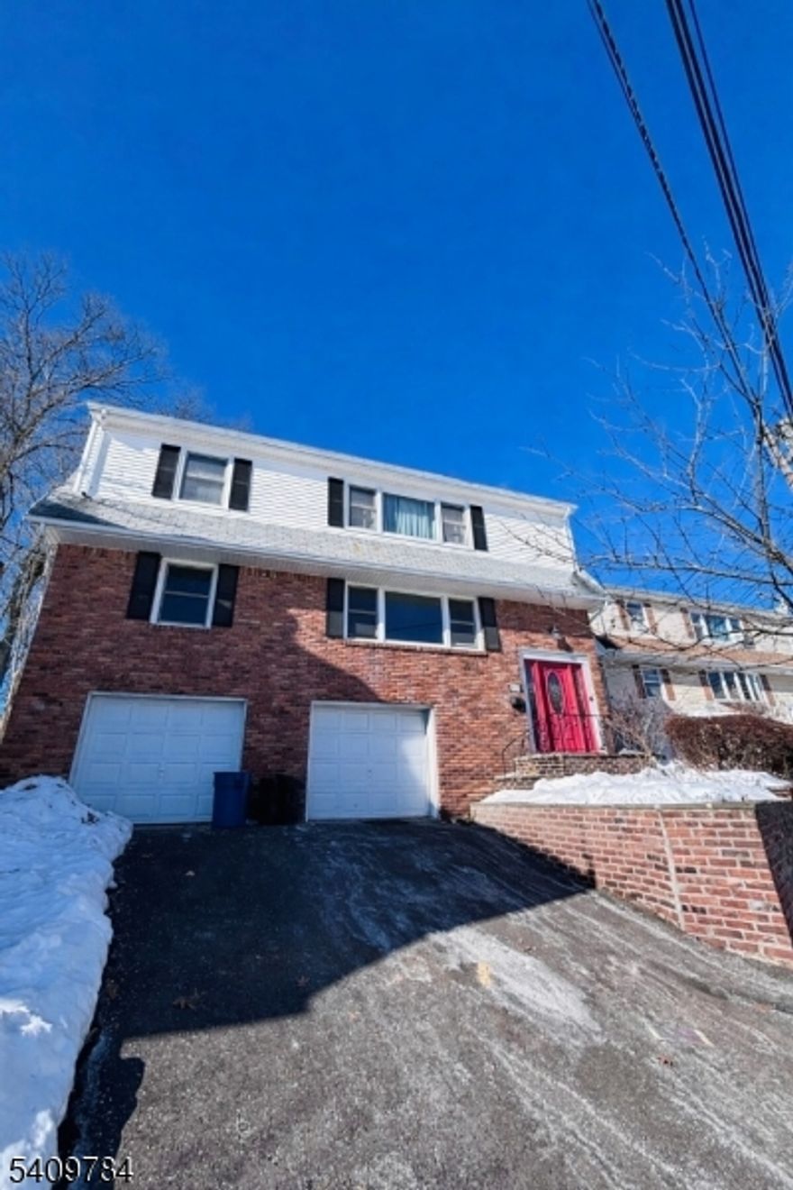 ATTENTION FIRST-TIME HOME BUYERS! Well-maintained 2-family house for sale. Each unit offers 2 bedrooms and a living room/dining room combo. All appliances included. 1st floor  is vacant. 2nd floor has CENTRAL AIR.  All separate gas utilities and a water softener system. Beautiful hardwood floors throughout. . Property includes a 2-car garage, driveway parking, and a private yard with outdoor decks. SOLD STRICTLY AS-IS. This property will not last