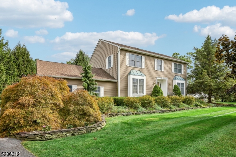 Welcome to this captivating colonial home nestled on a corner lot, boasting an array of desirable features and a picturesque outdoor oasis. Step into luxury as you explore this meticulously maintained property that offers the perfect blend of elegance and comfort. As you enter, you are greeted by a beautiful kitchen featuring a breakfast bar, butler's pantry and a gas stove, making it a chef's delight. The adjacent family room beckons with a full stone wall fireplace, creating a cozy ambiance for gatherings and relaxation. The updated main bath has a luxurious soaking tub, The master bedroom retreat awaits upstairs, complete with a spacious walk-in closet and a lavish oversized shower that exudes opulence.Step outside to discover a private yard with a 24-foot round pool, perfect for summertime enjoyment. The expansive deck and paver patio provide ample space for outdoor entertaining and relaxation, creating a serene retreat right at home. Additional highlights include a two-car garage, finished basement with a potential fifth bedroom, and a walkout basement offering versatile living space.This home truly offers the best of both indoor and outdoor living, making it an ideal sanctuary for those seeking comfort and style.Don't miss the opportunity to make this exceptional property your own and indulge in a lifestyle of luxury and tranquility in one of Vernon's most convenient neighborhoods.Schedule your showing today and experience the allure of this stunning colonial home!