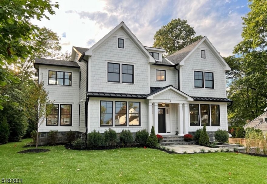 TOTALLY NEW CONSTRUCTION - a gracious 13 room, center-hall Colonial on a quiet cul-de-sac in the Woodland Park section. Short distance to the Franklin elementary school. Designed with Hardie shingle siding and accented with metal roofing, real stone and Azek trim including board on batten gable peaks and built-up columns. Anderson 400 series black windows. The well-appointed interior features high ceilings, Ultra-Craft furniture-grade cabinetry, Sub-Zero & Wolf professional appliances.  The butler's pantry offers a generous food prep area, wet-bar, Zephyr dual-zone beverage cooler and a separate food pantry closet. Craftsman inspired millwork, wide oak floors, central station security & fire alarm systems, pre-designed for a whole house generator, cable ports throughout, sound system in select rooms. 5 Bedrooms including an au-pair suite, second floor laundry. Extra wide, two-car garage has storage area plus an electric vehicle charging outlet,.  Mud room with built-in cubbies and bench seating. Walk-up attic. Large deck with natural gas hook-up.  Professionally designed landscaping. Sod lawn with irrigation system. Developed by Menza & Beissel, 14 Windsor Road is 100% newly constructed and as such, will be insured in a New Home Warranty Plan.