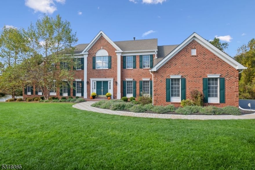 Welcome to this exquisite 6,000+ sq ft estate, a perfect blend of classic elegance & modern luxury, nestled on a lot that offers unparalleled privacy, backing onto preserved land. This home offers gleaming hardwood floors, custom millwork & luxurious details, all located in a top-tier school district. Step into the grand 2-story foyer, flanked by an elegant living room & dining room w/a sophisticated tray ceiling. Beyond, discover the heart of the home: a Chef's Kitchen featuring rich wood cabinetry, a brand-new cooktop, center island & a sunny Breakfast Nook. The adjacent Family Room boasts a cozy 2-sided gas fireplace & French doors leading to a Sunroom w/vaulted ceilings & skylights. An Office, a versatile Bonus Room, 1/2 Bath, Laundry & garage entrance complete this level. Upstairs, retreat to the expansive Primary Suite w/its own fireplace, featuring a spa-like Bath, separate tub+shower, WIC & a Sitting Room, currently used as a Dressing Room. 2 Beds share a Jack+Jill Bath, while 4th Bed enjoys its own en-suite.The finished walkout Lower Level is an entertainer's dream, w/a huge Rec-room, a pool entertainment Nook, 5th Bed & a Bath. There's space for recreation, guests & storage. Outside, the beautifully landscaped backyard is your personal oasis. Enjoy breathtaking sunsets from the expansive deck or tiered paver patio, host unforgettable gatherings by the heated gunite pool w/a beautiful waterfall feature. This home is not just a place to live, but a lifestyle to love!