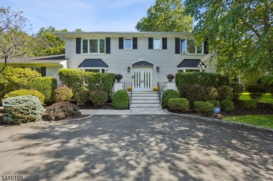 Prestine Center Hall Colonial perfectly situated in the sought after Chestnut Hill section of Livingston, picturesquely set on almost an acre estate-style setting with circular driveway.  Enter into the oval marble foyer highlighted by a curved staircase, first floor boasts a spacious living room which opens with French Doors to the library with custom built-ins. Glass sliders leads you to the scenic rear grounds and paver brick patio.  To your left is a large dinning room that connects to a well-designed gourmet kitchen which offers perfect workspace and light.  Kitchen opens to the Great Room and a large eat-in area with additional sets of glass sliders to patio, overlooking the scenic and private back yard. A guest bedroom (plumbing ready) in the back and a power room completes 1st floor. 2nd floor has 4 large bedrooms and 2 full baths. Basement is finished with an additional bathroom and ample living space. Well manicured property is equipped with underground lawn sprinklers. This lovely maintained home has everything you need for entertaining and daily enjoyment!