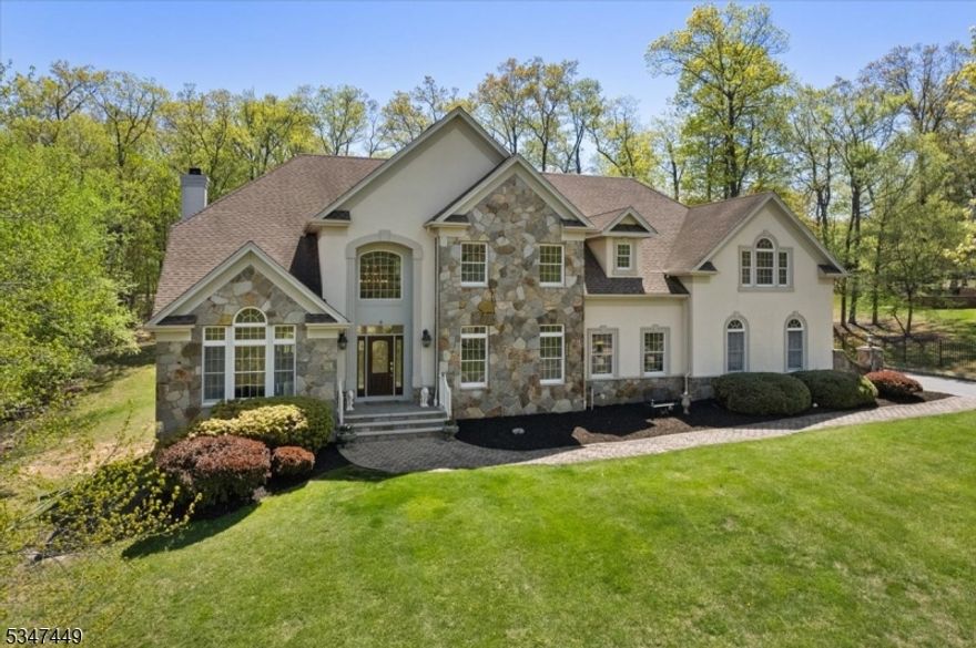 Welcome to 6 Strawberry Ln, a stunning 6-bedroom, 4.5-bathroom estate built by CRC Communities in 2000. Located in one of Warren's most prestigious neighborhoods, this home offers a perfect blend of luxury and functionality.The open-concept main level features a spacious living room, eat-in kitchen, formal dining room, and sitting room, ideal for both entertaining and everyday living. A main-floor bedroom with an en-suite bath provides convenience, while a dedicated laundry room adds practicality. Upstairs, the primary suite is a private retreat with an en-suite bath, complemented by four additional bedrooms with Jack and Jill bathrooms. The walkout basement, currently used for storage, office space, and a gym, offers endless possibilities for customization. Set in a private neighborhood, this home provides convenience to local amenities, elegance, and exceptional space.