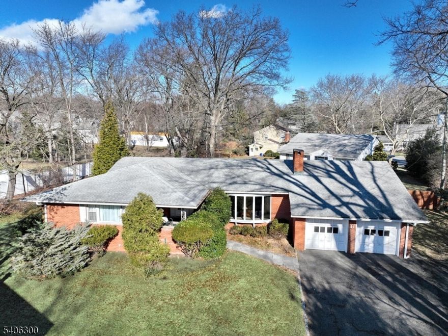 Welcome to this classic brick ranch set back from the street on a generous lot, offering privacy and a peaceful setting on a quiet interior street. This home features 3 bedrooms and 2.5 baths, a sunken living room with a wood-burning fireplace, and hardwood flooring throughout. The thoughtfully designed layout includes a comfortable den, formal dining room, and an eat-in kitchen with a great flow for everyday living and entertaining. Additional highlights include a two-car garage and a generator for added convenience and peace of mind. The expansive basement is partially finished and offers Bilco door access, presenting endless possibilities for additional living space, recreation, or storage. Ideally located close to schools, bus transportation, and major highways, this home combines charm, space, and convenience in a sough-after neighborhood. This is an estate and is being sold in strictly as is condition. All chimneys and flues are being conveyed as is with no known issues. Security contract transfers to buyer. Buyer responsible for CO. Make your appointment today!