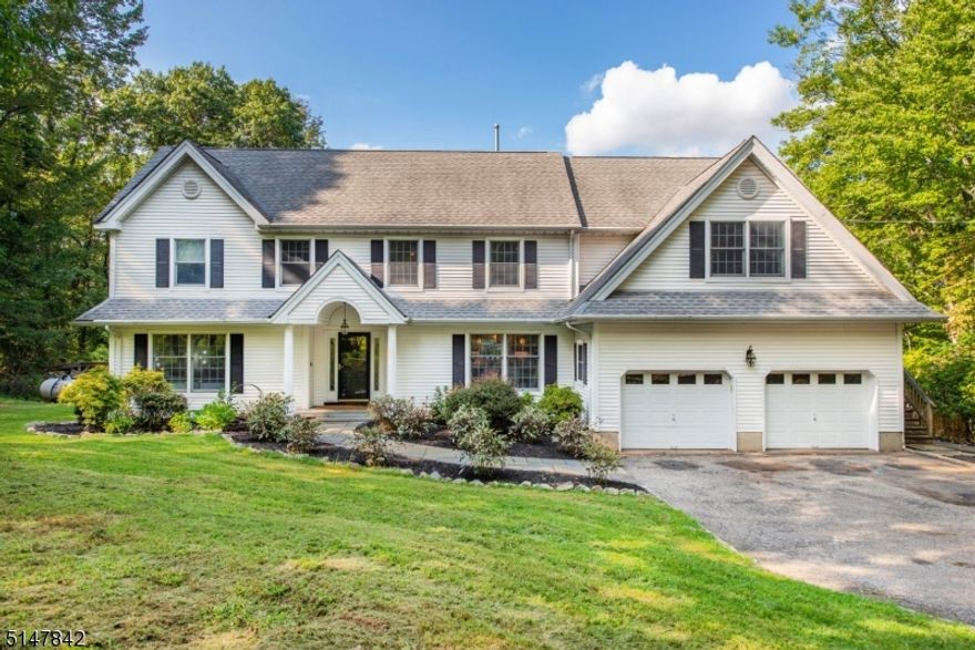 Renovated colonial, very open concept floor plan with spectacular kitchen - huge center island, large dining area, quartz countertops, stainless steel appliances, wall ovens and electric cooktop with hood vent.  Family room with woodburning stove insert, custom built-in bookshelves, beamed ceiling and recessed lighting.  Four spacious bedrooms, including primary with huge sitting room and full bath plus en suite  on second floor.  Home office, finished walk-out basement, pull down attic storage are some of the additional features.  Inground concrete pool has newer filter and pump.  Boilermate, 2019 central air, baseboard hot water and multiple zone Eco-vent HVAC are highlights of this beautiful home!  Long Valley schools and West Morris Central High School.  Minutes to shopping, movie theater, Home Depot, Starbucks, dining and more.