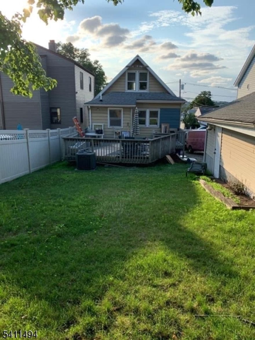 AVAILABLE APRIL 15! Renovated duplex includes floors 1 and 2, a private backyard with deck, 2 cars driveway, central air and all appliances. Sun-filled 1,300 sq ft home is located on a quiet street and 3 blocks to NYC bus stop, Ridge Road restaurants and shops! It's a short 5 minute drive to NYC train station, Shop rite, schools, etc. Duplex apt features open concept living / dining room, new bathroom, 3 bedrooms, bonus sunroom den, and kitchen with access to backyard and laundry room. Renovated kitchen features Quartz countertop, subway tile backsplash, soft-close cabinets and SAMSUNG stainless steel appliances. No pets. No smoking. Rent includes water and sewer. Renter's Insurance required.