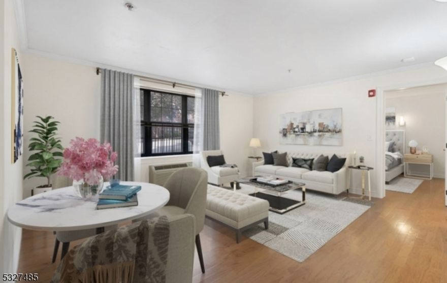 Experience the perfect blend of convenience, style, and safety in this meticulously crafted 1-bedroom, 1-bathroom unit, located just steps from Morristown's vibrant Green. Built by the award-winning Developers, this exceptional building showcases unparalleled attention to detail, premium quality, and top-tier safety features, including a secure intercom entry system with wireless key access, two-hour fire-resistant construction, a Cummings generator, and state-of-the-art elevators. Inside, you'll find a spacious bedroom that provides ample room complete with a generous walk-in closet for all your storage needs, and beautifully designed bathroom. The kitchen features sleek stainless steel appliances and Ceasarstone countertops, ideal for both cooking and entertaining. Gleaming hardwood floors flow throughout the living and dining areas, adding warmth and sophistication. Additional conveniences include an in-unit washer and dryer for effortless living. Residents enjoy access to a range of premium amenities, including mandatory off-street parking, on-site storage, and a fully equipped exercise room. All of this is set in a quiet, desirable neighborhood, offering both tranquility and proximity to Morristown's premier dining, shopping, and entertainment. Don't miss this opportunity to live in one of Morristown's most sought-after developments.