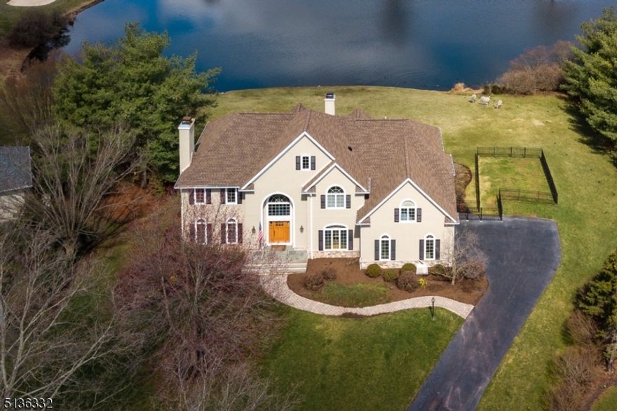 Showcasing the finest Cherry Valley has to offer, this stunning home is part of the prestigious Custom Club Collection and has one of the most coveted locations in the entire community with glorious views and close proximity to the clubhouse. A raised deck that feels like it was plucked right out of Versailles is the perfect setting to take in the spectacular water vistas and views of the ninth hole. Throughout the interior is a comfortable atmosphere with beautiful natural light geared toward entertaining. The great room features a wet bar and double-sided fireplace shared with the kitchen. When it?s time to sit down to dinner, a beautifully presented dining room lies opposite the formal living room. A home office is just the right size to get some work done, while the finished basement that opens to the patio and huge yard adds another level of fun, including a big bar area, media space with built-in banquette, home gym with sauna, guest bedroom and full bath. On the second floor, the main bedroom suite wows with its views, incredible closet and wardrobe storage, and an updated, marble-accented bathroom. Two other bedrooms share a Jack and Jill bath, and another bedroom and bath are reached via a private staircase near the kitchen?making it ideal for live-in help or an in-law set up. Ideally located just moments to the clubhouse for golf, swimming, tennis, bocce ball, pickleball, and a new state-of-the-art fitness center, and mere miles to the heart of Princeton.