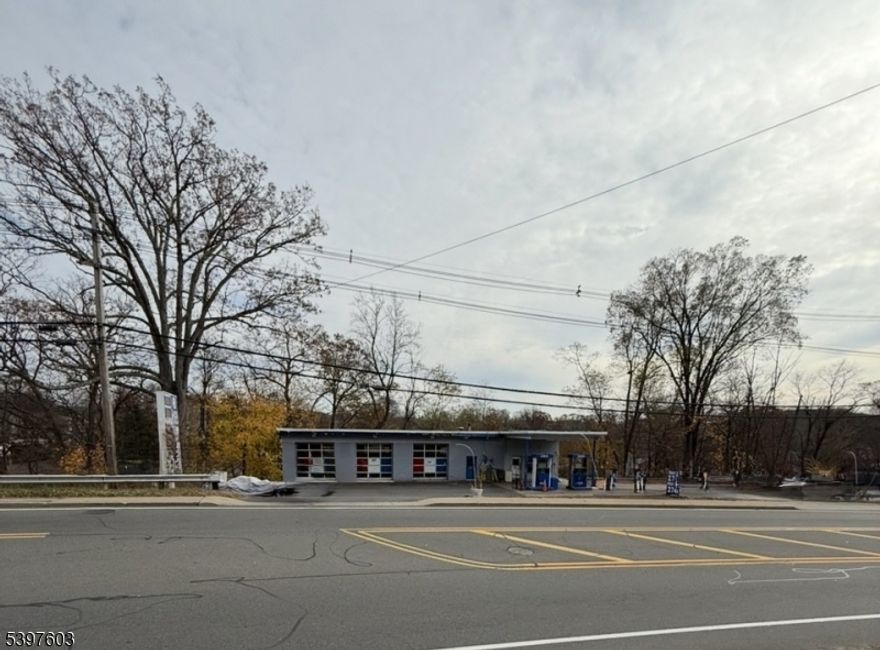 Prime Location In Hopatcong on over a half acre.  Gas Station and 3 Front Bays with another Bay in the rear of the property.  In the three front Bays there are 3 Lifts and an extra two spaces for additional parking inside the heated garage.  In the additional bay in the rear it also includes a lift and a heated mechanics/machine shop area and additional parking.  3 bathrooms and additional parking outside. The office is shared with the gas station operator.   A freestanding sign and over 50 feet of road frontage.  Borders Morris and Sussex Counties and near major highways.