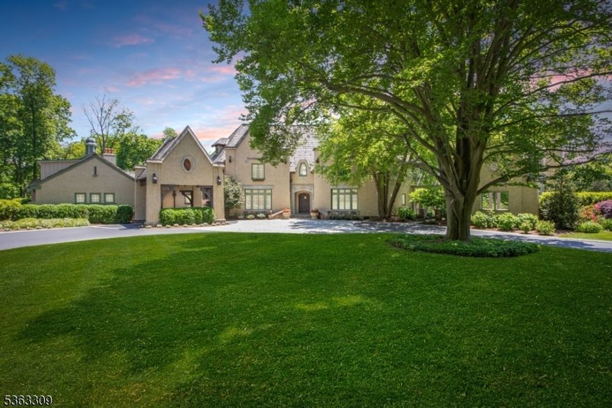 This extraordinary French Provincial Estate has undergone meticulous renovations & expansions, elevating the main house, carriage house, & cottage to the pinnacle of luxurious living. Nestled on over 14 meticulously landscaped acres the property offers breathtaking views both inside & out. Step inside to discover an array of unmatched architectural details. The home boasts a billiards room, bar, media room, office, library, & 5 ensuite bedrooms. With a total of 8 fireplaces, 6 indoor & 2 outdoor, as well as 2 fire pits, the ambiance is warm & inviting. Multiple sets of French doors lead to terraces, including an expansive bluestone terrace equipped w/kitchen, dining areas, & water feature perfect for entertaining guests. A 40-foot heated pool, allows for a leisurely swim. A fabulous carriage house complete w/kitchen & full bath provides dynamic living space, while a three-bedroom cottage offers extra accommodation options. For car enthusiasts, there are 6 heated & humidity-controlled garages. Rest easy knowing that the property is equipped with high-end security, utility, & mechanical systems. The stucco exterior is crafted with the finest masonry. Sprinkler and snow melt systems are in place for added convenience. From its stunning architecture to its meticulously designed interiors, every aspect of this property exudes timeless elegance & sophistication. Don't miss the chance to make this unparalleled estate your own.