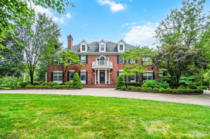 Nestled in the prestigious Ravenswood Estate neighborhood of Far Hills, Bernards Township, this breathtaking five-bedroom Georgian Colonial is a masterpiece of timeless elegance and modern luxury. Set on a parklike 2.33 acres in a serene cul-de-sac, the property is enveloped by meticulously manicured grounds, mature hardwoods, fruit trees, raised vegetable garden and colorful plantings throughout all creating a private sanctuary of unparalleled beauty. If you are in the market for sophisticated luxury without being pretentious, this home is a must see.