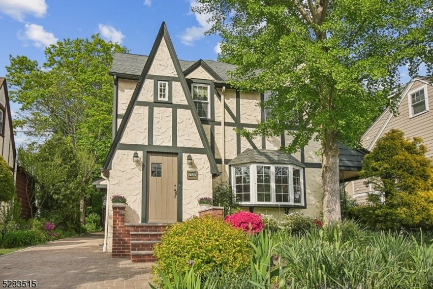 This bright and artful Tudor-style home has been completely renovated, expanded and updated throughout.  With careful attention to detail and stylistic integrity, has been created to make the most of the spaces. The thoughtfully designed 3-story addition creates a fantastic kitchen and family room, an expansive primary suite with two walk-in closets and large bathroom and an enormous flexible bonus-space in the lower level that can adjust to the growing needs of anyone who resides here.  Every space in this well thought out and custom designed home is completely move-in ready!  There is beautiful art at every turn inside and extends to the great outdoors with the spectacular 3-season scented perennial gardens.  Inviting, artful and warm; the perfect place to call home in a dream location-only minutes from schools, Taylor Park, the vibrant downtown of Millburn and the NYC Midtown Direct train.