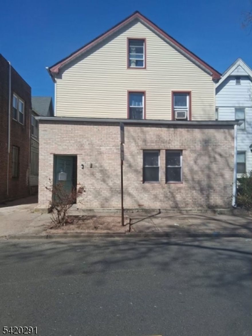 2 family house in East Orange. 1st Floor features living room, dining room, kitchen, 3 bedrooms and full bath. The 2nd floor combined with attic features living room, eat-in kitchen, 4 bedrooms and 2 baths. A partially finished basement includes 3 rooms and a bath. Big backyard, garage and an ample driveway with parking for up to 10 cars.