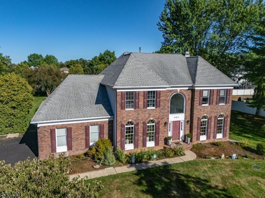 Welcome HOME to this Beautiful BRICK Front Col Nestled on a lovely 1.01 Ac Lot within the Gently Rolling Hills of SCENIC & Highly Sought After "STEWARTS HUNT" Community of Stewartsville! PACIOUS lay-out Boasting nearly 3,000 Sq Ft w/Extensive CUSTOM updates throughout! So many NEW Finishes, Fixtures, Gorgeous MOLDINGS & HARDWOOD! Natural Lighting! NEUTRAL Interior! 2 Story Foyer w/PALLADIAN Window & Elegantly Turned Staircase! Formal DR & LR w/Wide Plank HARDWOOD Flooring! GRANITE Topped CENTER ISLAND w/PENNANT Lighting & BRKFST BAR! 42" Cabinets! STAINLESS appl's! Butler's PANTRY w/WALK-IN! FR w/BRICK FP, BUILT-IN Shelving & TRIPLE Window! 1st Flr LAUNDRY w/SINK & CUSTOM Dr! Incredible PR w/TRAY Ceiling, VESSEL Sink, MARBLE Flr, TILE & Custom Fixtures! Primary BR w/Beautiful Double Dr Entry, NEUTRAL Decor, WIDE PLANK H/W, WALK-IN Closet & Private EN-SUITE BATH (CATHEDRAL, SKYLIGHT, TILED Shower, SOAKING Tub, 2 Vanities) 3 SPACIOUS Add'l BR's w/H/W! STUNNING Remodeled MAIN BATH (Gorgeous TILE, Fixtures & Finishes!) Partially Finished BSMT w/BILCO & POOL TABLE! GAR w/MINI SPLIT, Shelving, INSULATED Drs w/Openers! Fabulous Outdoor Space Includes a COVERED PATIO w/RECESSED Lights, IN-GROUND POOL w/NEW LINER-2025, a HOT-TUB, Shed, Firepit & a GREAT 1+ Ac Yard! Located Just MINUTES to the TWP PARK, COMMUTER Rts & Most CONVENIECES! Nat GAS Heat! Humidifier on Furnace! C/A! Water Softener! PUBLIC Water! Private Septic! Get Ready to Pack!  You can finally say..."Honey, We're HOME!"