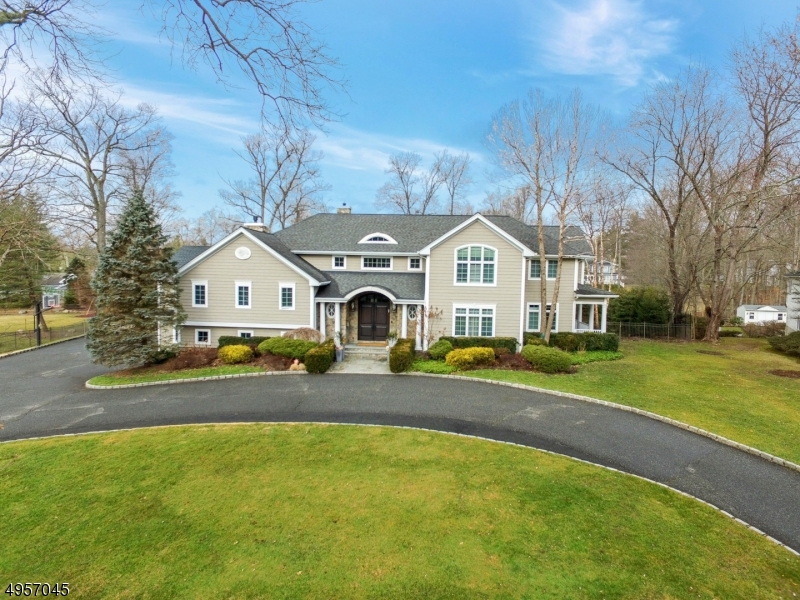 This magnificent six-bedroom, four and two-half bath custom colonial home is fully updated with thehighest quality finishes. The gourmet custom kitchen features top-of-the-line appliances, oversized marble center island, custom cabinetry, marble backsplash, and a beautiful eat-in area. The stunningmaster bedroom suite hosts a sitting room, two-sided fireplace, gorgeous dual custom Californiaclosets, and spectacular master bath. This home features closed-circuit monitoring and a whole housegenerator. Sitting on .95 of an acre, the serene and tranquil backyard features a private putting green,outdoor kitchen, entertainment area, Inca freeform pool and waterfall, Treks deck on a large flat park-likeproperty. This home is one of a kind.  Surgical gloves provided.