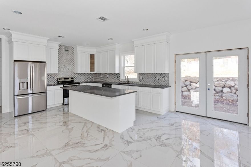 Welcome to this incredible and rare Custom Built New Home Construction. Situated on over 1/3 acre in desirable lake community of Hopatcong. Custom 4 Bedroom, 3 full bath Colonial with over 3400 sq ft of living space and an additional 1446 sq ft unfinished basement - customize to meet your needs, home gym, playroom, cozy home theatre.  Cultured stone and Vinyl siding exterior. Hardwood flooring and recessed lighting throughout. Exceptional craftsmanship - custom details/upgrades. First level offers Two Story Foyer, Living Room, Great Room, Gourmet Kitchen with pantry, Breakfast room, Dining Room, Office plus Study/Den/BR and Laundry Room. Potential in law suite on first floor. Second level features Master Bedroom Suite with walk in closet, luxurious master bath, three additional bedrooms and full main bath. Welcome to the largest freshwater lake in New Jersey! Situated less than an hour from the heart of NYC, a perfect retreat for those who want city access and suburban tranquility.  The nearby Mahlon Dickinson Reservation offers a wealth of outdoor activities including hiking, boating, swimming! A rare opportunity for quality new construction -  this custom Colonial has it all.