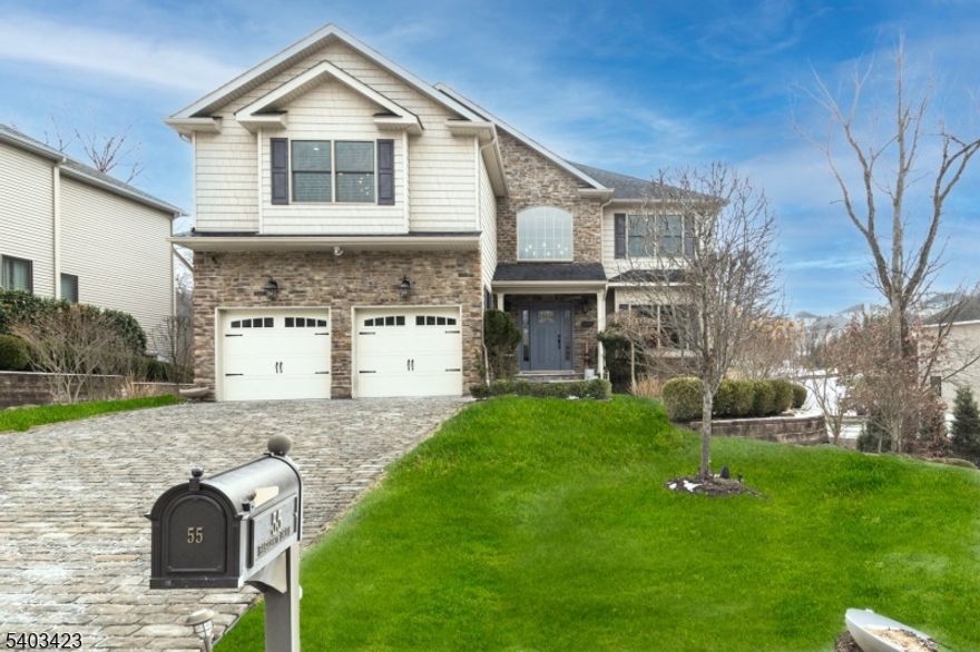 Located in the sought after Reserve at Bel Air, 55 Haggerty is a contemporary 4 bed 2,5 bath Colonial .This move in ready residence is approx. 2870 sq. feet across 3 finished levels.Three levels of living area including a spacious walk out basement the opens onto a patio and backyard. Main level boasts a comfortable floor plan with hardwood floors and first floor laundry.  Modern designed kitchen with high end appliances and center island.  Four upper level bedrooms, including primary suite with two walk in closets and master bath featuring double vanity and jetted tub.   Set on a private.43 acre lot with upper level deck and large stone patio perfect for entertaining.  Located directly from a neighborhood playground and the jitney stop offering transportation to South Orange train stations for an easy to commute to NYC.  School bus stop is also right across the street.