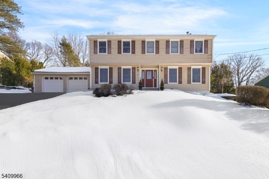 Fall in love with 10 Stuart Ct in Montville this Valentine's Day! This stunning 5 bedroom, 2.5 bathroom colonial with a heated pool can be yours in time for summer. The first floor features a cozy living room with fireplace, an eat-in kitchen with a large island open to the dining room, a spacious family room, powder room and a charming sun room with soaring ceilings. Upstairs, you'll find a primary suite with a full bathroom, 4 additional bedrooms, a full hall bath, and a convenient laundry room. Perfect for gathering and entertaining, the home offers a charming wraparound deck, a fully fenced yard, and a heated in-ground gunite freeform pool with paver surround also fenced for added safety. Short walk to elementary school on a quiet tree lined street in the Pine Brook section of Montville. Come see all that Montville Twp has to offer, from top rated schools to 5 star restaurants and easy access to highways, buses/trains to NYC, you will not be disappointed. Short drive to NYC bus and Towaco Train Station. All public utilities. Low taxes.