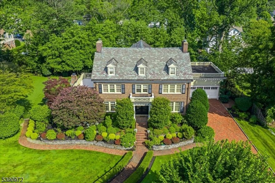Timeless Elegance Meets Modern Luxury in This Fully Renovated 1925 Gem with over 8,000 sq. ft. of living space was meticulously rebuilt in 2016 down to the studs, blending old-world charm with every modern convenience.A grand, oversized foyer welcomes you into the home w/soaring ceilings and rich architectural Details, setting the tone for the elegance that follows.The main level features a spacious living room, formal dining room, & a beautifully enclosed sunroom-ideal for morning coffee or afternoon reading. A 1st fl bdrm ensuite offers flexibility for guests, while a dedicated office provides the perfect space for working from home.Upscale, show-stopping kitchen was designed like a true masterpiece, blending timeless elegance with cutting-edge functionality & exquisite custom finishes throughout. At the heart of the home, a sweeping statement staircase w/ exquisite woodwork gracefully connects all levels, serving as both a visual centerpiece & a functional design feature. Upstairs, each bdrm is generously sized, while the primary suite offers a serene retreat w/spa-like amenities.The finished bsmnt is an entertainer's dream, BOAsting a custom-designed bar & home theater, a fully equipped gym & a climate-controlled wine room perfect for the connoisseur.Every inch of this home has been thoughtfully updated w/premium finishes, top-tier systems, and tastefully nods to its 1925 heritage creating a one-of-a-kind residence where history & luxury meet.
