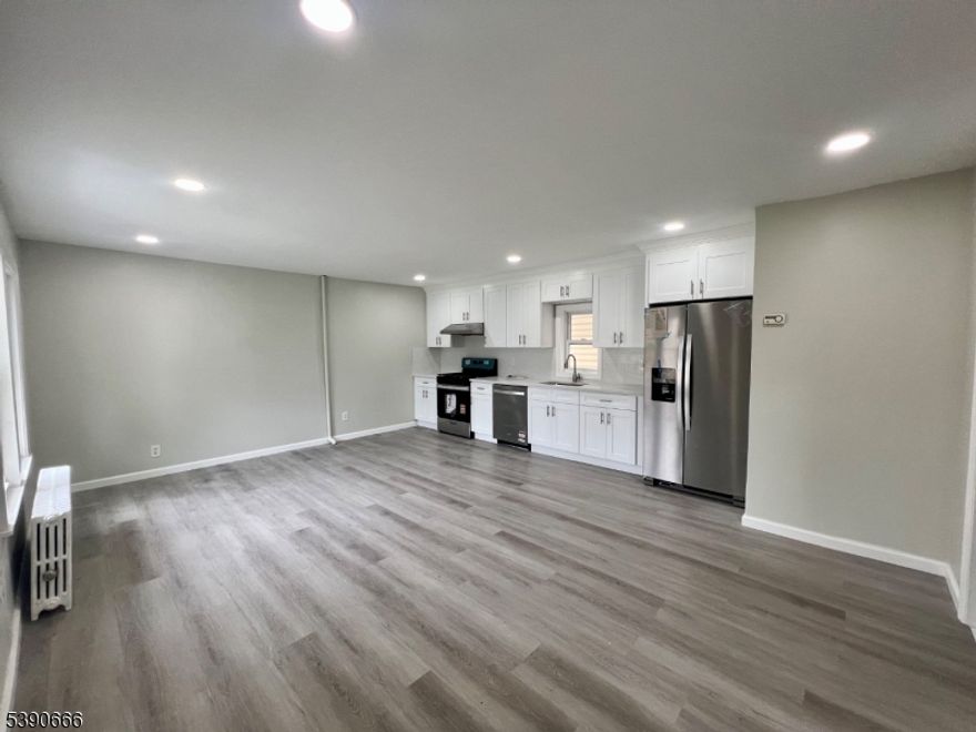 Must see! Nice 2 bed and 2 full bath house in North Plainfield between Route 22 and Route 28. Renovated Kitchen with Open Space concept of Living/Dining/Kitchen and Family Room. New LVT Flooring on ground floor and second floor. Renovated 2 Full bath with standing showers. New Windows on Second Floor. Full unfinished walkout basement. Detached Garage and two car driveway with large open lot.