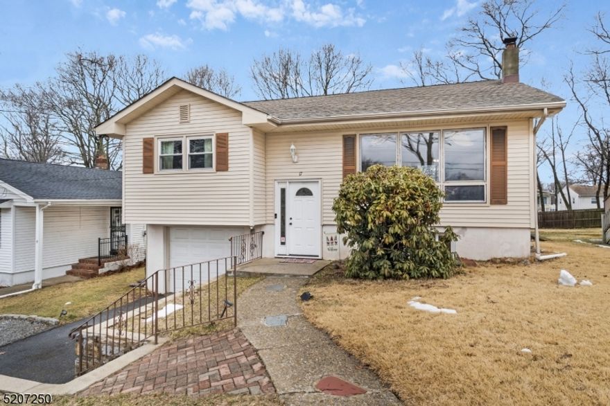 This is the one you've been waiting for!  Spacious 2 bedroom 1.5 bathroom Bi-Level in Landing NJ Roxbury Township! Through the front door and up 5 steps to the main floor you are greeted to an open floor plan in the living room and dining room creates a great flow, and the slider door off the dining room leads to a freshly painted deck. The fully fenced flat  backyard offers privacy and security. Back inside the Kitchen has black appliances and will feature NEW cabinet doors and soft close drawers with new hardware ! (See Photo). Down the hallway you will find two oversized bedrooms and a full bathroom to complete this floor. Down the stairs, the spacious lower level family room and half bath offers flexibility and could be converted into a third bedroom if needed as current homeowners are using the space. Laundry Room is outfitted as a walk-in closet. The most recent renovations include the powder room renovated in 2020 and tile flooring in the living room in 2021. Wood burning fireplace heats whole house efficiently. Access to the attached heated garage and access to the backyard through a slider door are two wonderful features to complete this level. Pull down attic has an abundance of space for all your storage needs. Home currently runs on oil (above ground) but gas is available in the street for conversion. With it's desirable location to major highways, lake, and school this home is a great find in the Landing neighborhood.