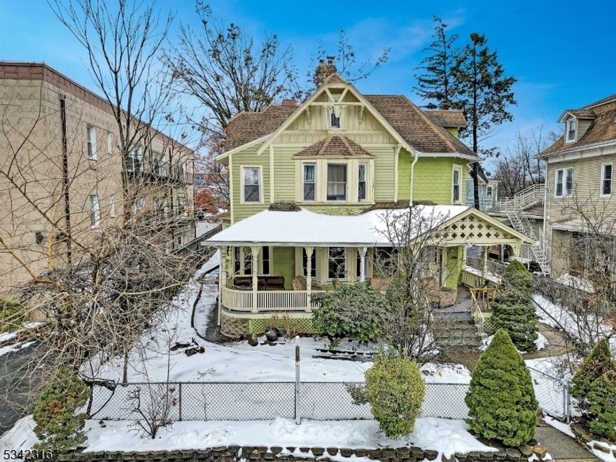 Prime Income Property in the Heart of South Orange - Steps from Seton Hall! Discover an exceptional investment opportunity with this stunning Victorian home in the heart of South Orange. Boasting 11 bedrooms and 3 full baths and in house laundry, this expansive property offers a unique blend of historic charm and modern convenience, perfect for generating significant passive income.The home features a wrap-around front porch, ideal for relaxation, and ample yard space, adding to its appeal. Inside, spacious rooms provide comfortable living arrangements, making it a sought-after rental property. Recent capital improvements ensure long-term value and minimal maintenance concerns for the next owner. With its most recent lease at $9,500/month, this property presents strong, consistent rental income. Its prime location just blocks from Seton Hall University ensures steady demand from prospective renters. Additionally, the home is conveniently situated near shops, restaurants, NYC transportation, and all that South Orange has to offer. Whether you're an investor looking for a high-yield asset or someone seeking a turn-key rental property in a thriving community, this Victorian gem is not to be missed. Preference is to sell with 120 Milligan MLS#3998004