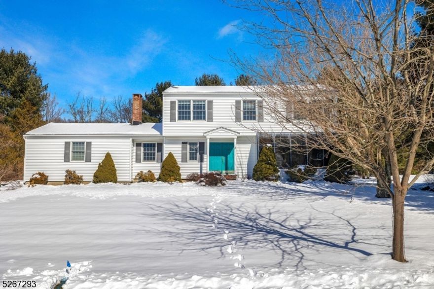 Fantastic home in a highly desirable neighborhood, close to Patriot's Path! Quail Ridge colonial with expanded kitchen offers extra living space not found in others. Paver front walk leads to covered front porch and into the welcoming foyer with tile flooring and coat closet. French doors lead to living room featuring greenhouse window for extra natural light, and wall of built-in bookshelves. Kitchen offers tile flooring, gas cooktop range and double wall ovens, trash compactor, additional veggie sink and ice maker. Adjacent breakfast room has vaulted ceiling, skylights, wall of windows and sliders to newer entertainment sized deck overlooking level and usable backyard. Formal dining room, powder room and family room with gas fireplace complete the main level; Hardwood floors are featured in family room, living room, dining room. Upstairs features main bathroom, 4 spacious bedrooms, including primary suite with walk-in closet and full bath. Many low maintenance and newer features include central vacuum, thermal windows (10 yrs), roof (7 yrs). Quail Ridge has miles of sidewalks, public water and sewer and close to Rt. 80 for commuting. West Morris Central High School, recognized as tops in NJ, offers AP classes and IB program.