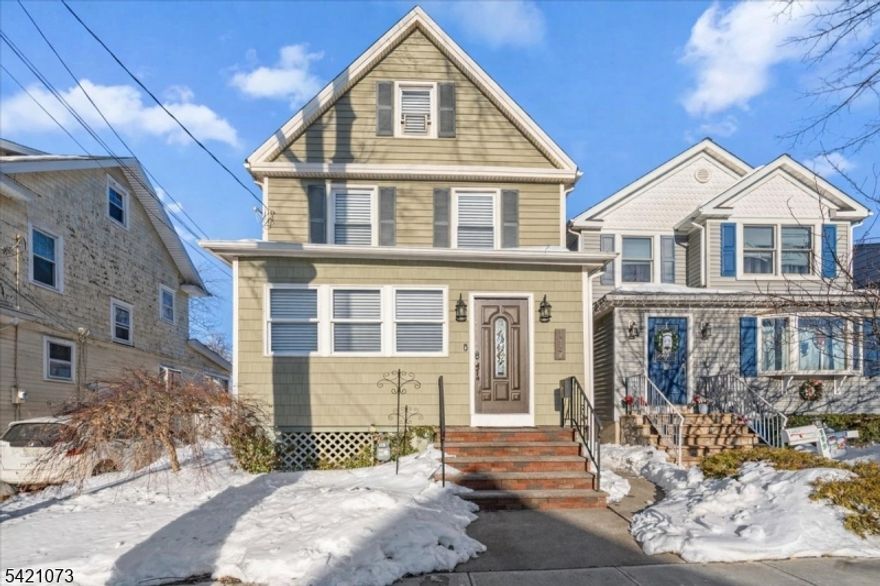 Easy NYC commute, flexible living space, and a private backyard this one has it all.Welcome to this inviting 3"4 bedroom Colonial offering the perfect blend of comfort and versatility. The enclosed front porch with built-in storage is ideal for busy mornings or relaxing with coffee.Inside, enjoy an open-concept living and dining area designed for everyday living and entertaining. The kitchen features natural gas cooking, stainless steel appliances, recessed lighting, ample cabinetry, and a breakfast bar.A bright sunroom off the kitchen provides bonus space perfect for a home office, playroom, or dining nook with access to the fenced backyard.Upstairs offers three bedrooms and a full bath, while the finished walk-up attic serves as a potential fourth bedroom or bonus space. A full basement with a half bath adds even more functionality.Enjoy outdoor living with a patio, pergola, garden area, and storage shed.Prime commuter location just 3 minutes to Roselle Park train station and 7 minutes to Union train station. Close to the Garden State Parkway, restaurants, and schools for easy everyday living.
