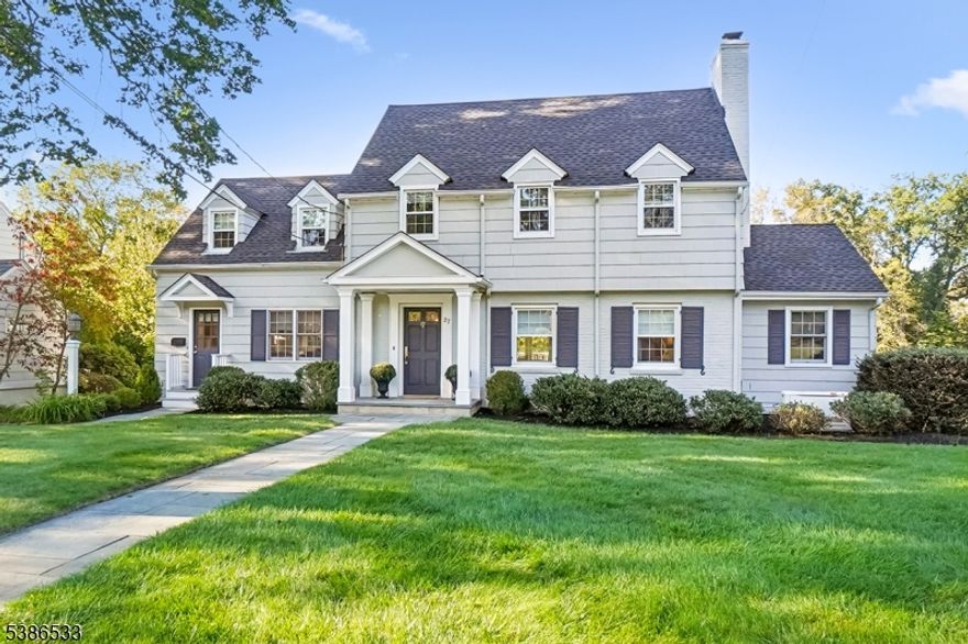 Location. Luxury. Lifestyle. This stunning 5 bedroom Colonial sits on approx. 0.75 acres in the desirable Lincoln-Hubbard Elementary district, close to downtown, NYC trains, parks, and top-rated schools. Beautiful hardwood floors throughout. The designer kitchen features custom white cabinetry, granite countertops, and high-end appliances: Dacor 6-burner cooktop, Miele dishwasher, Sub-Zero fridge. A center island and banquette breakfast area open to an elevated deck overlooking manicured lawns. A mudroom with cubbies and separate entrance adds convenience. Enjoy a fireside living room, formal dining room with French doors to the deck, and a vaulted family room (2021) with wet bar and beverage fridge. The first-floor home office (2021) has a beamed ceiling and could serve as a bedroom. The spacious first-floor primary suite (2021) offers oversized windows, a custom walk-in closet, and a luxurious bathroom with double vanity and frameless glass shower. Upstairs are four bedrooms with hardwood floors, including an en-suite and a main hall bath. The expansive walk-out lower level includes a stone fireplace, rec room with built-ins, bonus/playroom/office, and access to a paver patio, parking court, and attached oversized 1-car garage. A heated 2-car garage connects to a laundry/utility room with workshop. Updates: windows, driveway, powder room, and deck (2022); roof and generator (2020). Welcome to 27 Beekman Road refined suburban living.