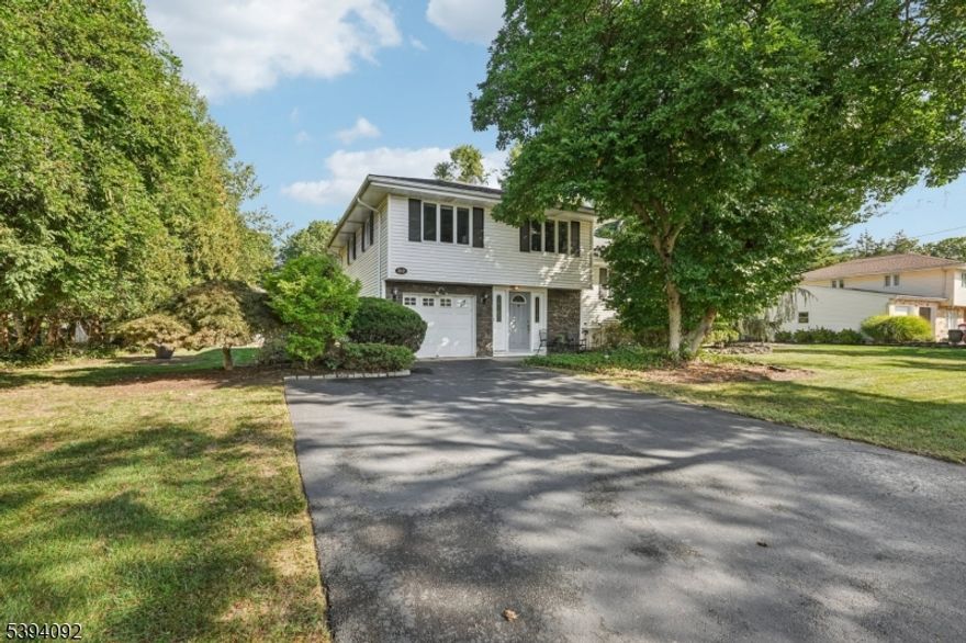 Welcome to this beautifully maintained split-level home offering the perfect blend of comfort, functionality, and style.This home features thoughtfully designed living space, perfect for entertaining inside and out. Featuring 3 bedrooms, a full bath, and 2 half baths. Enjoy entertaining in the formal DR, cozy nights in front of the fireplace ,or the perfect afternoons spent in the sunroom. This beautiful home also has a Generac generator.