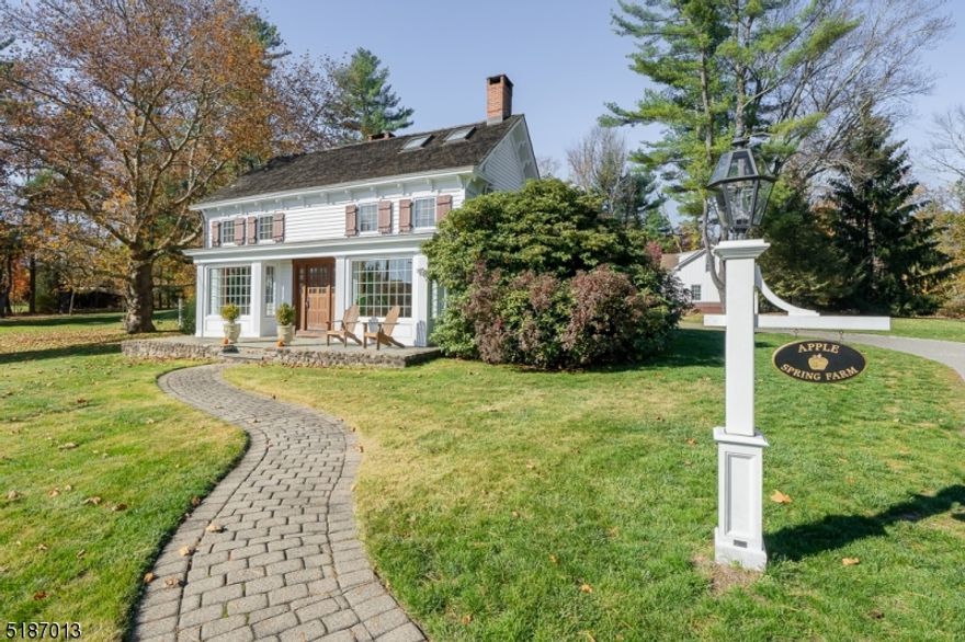 Stunning Apple Spring Farm in great location in Green Village section of Harding Township includes beautiful main house, carriage house, outbuildings, pool, and expansive lovely property. Over 2 acres of beautifully landscaped private property that can be seen from every window in the house. Main house has gorgeous historic features with modern renovations and amenities. Beautiful large kitchen has wood burning fireplace, large center island, high-end appliances including 2 refrigerators, 5 burner cooktop, and 2 wall ovens.  Kitchen is open to bright family room with sky lights and large windows. Large formal DIning room and living room provide lots of living space.  Powder room and laundry also on first floor. Gorgeous blue stone patio off the family room and second patio with pergola off dining room.  Second level has unique original wide plank pine floors with 4 bedrooms including primary suite with huge walk-in closet and full bath.  3 additional bedrooms and hall full bath on 2nd level.  Charming large carriage house provides more living space with 2 offices, one bedroom, 2 half baths, sitting room, wine room and more storage.  Carriage house also has 3 garage bays.  The property is expansive with gorgeous views of open protected fields across the street, beautiful pool and gazebo and lots of privacy. Long pea stone drive has lots of additional parking space.  This idyllic setting is located just minutes away from everything you need!