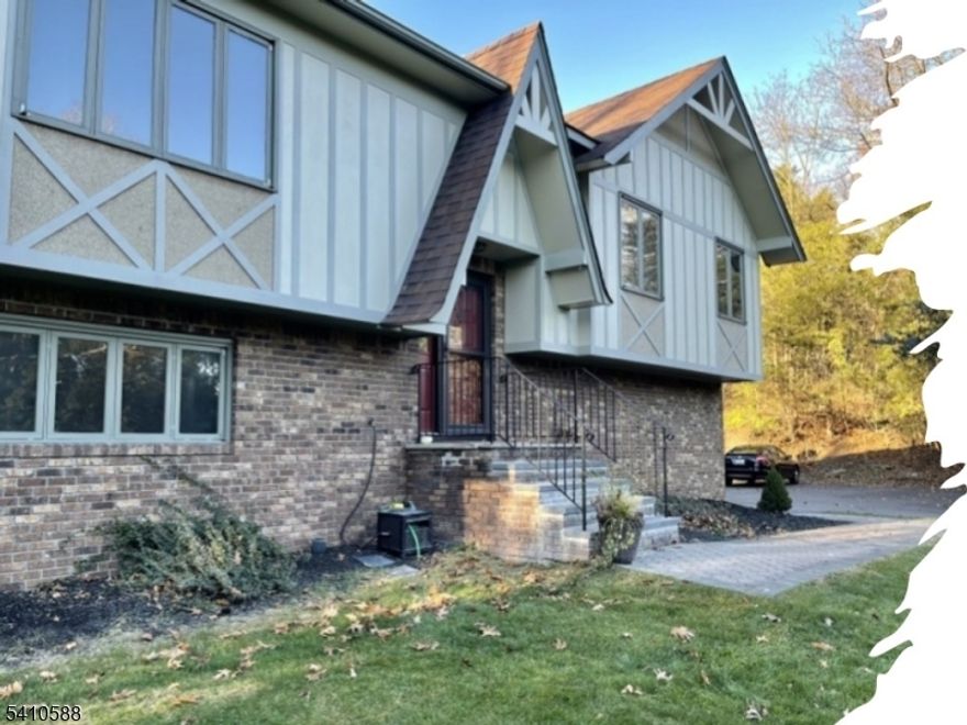 This home, built by the landlord, is on 1.62 acres and was newly renovated in 2026. The interior has been freshly painted, showcasing an open floor plan. It features a glass storm door and an eat-in kitchen equipped with stainless steel appliances, including a microwave, refrigerator/freezer, stove, dishwasher, and in-unit washer and dryer.On the main floor, you'll find the newly renovated kitchen, a sitting room, and a dining room combo with new wood floors. The primary bedroom is accompanied by two additional generously sized bedrooms, a newly renovated full bath, and a linen closet. The lower level includes a laundry room, a recreation room, a fourth bedroom, and another newly renovated full bath. Two sliding glass doors lead to a brick patio with a walkway to a fenced in-ground pool and a storage shed. The location is convenient, close to shopping, major highways, and restaurants. In addition to the renovated bathrooms and fully updated kitchen, the stairs are accented with new carpet, and the garage is finished with additional storage.