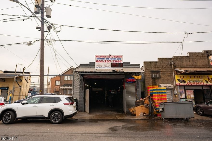 This is your chance to own a turnkey mechanic shop in one of Newark?s most vibrant and high-traffic neighborhoods. Located in the sought-after Ironbound section, this commercial property comes fully equipped with 3 car lifts and a powerful compressor, making it ideal for any auto repair, tire, or service business. The spacious interior offers plenty of room to work efficiently, and the prime location ensures strong visibility and steady foot traffic. Whether you're expanding your current business or launching a new one, this property gives you the space, equipment, and location to hit the ground running. Come be the owner of this building today ? make your best offer and turn the key to your future!