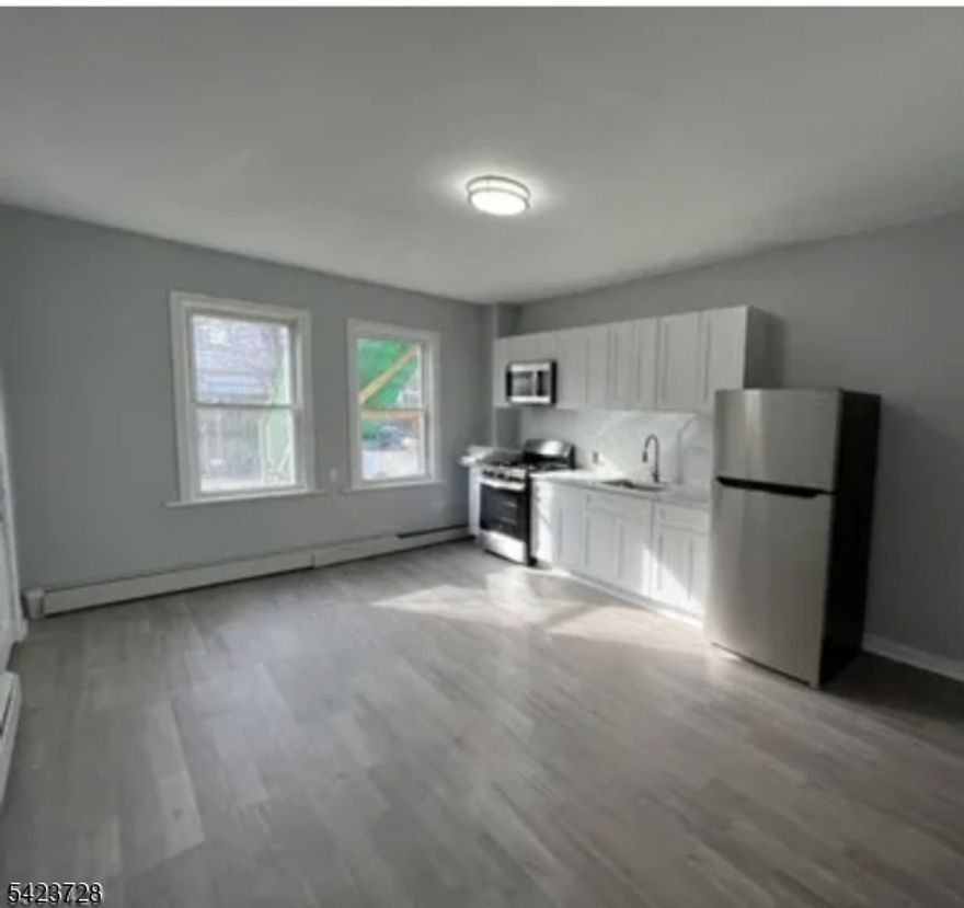 This inviting two-unit under-over multi offers an excellent opportunity for owner-occupants and investors alike. With some updates completed in 2022, this property is ready for you to add your finishing touches and start building equity and income. The lower-level unit features 1 bedroom, 1 full bath, a comfortable living room, and a functional kitchen ideal for rental or first time buyer. The upper-level unit offers 2 bedrooms and 1 full bath, a kitchen, and an open living and dining room combination, plus a walk-up attic that provides additional storage or future potential. Enjoy the convenience of both off-street and on-street parking. Whether you're looking to live in one unit and let the rental income offset your mortgage or add a solid property to your investment portfolio, this multi delivers flexibility and opportunity. Finish the updates to your taste, sit back, and collect the rents!