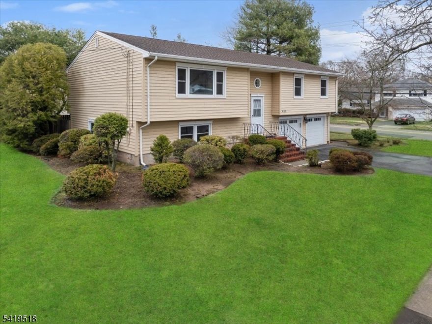 Welcome to this Beautifully maintained 4-bedroom bi-level home located in a desirable Fair Lawn neighborhood. This spacious residence features hardwood floors throughout, offering warmth and character across the main living areas. The upper level includes three bedrooms, including a primary bedroom with an en-suite bath, while the lower level provides an additional bedroom generously sized, filled with natural light, ideal for guests, a home office, or extended living space.The home also offers a two-car garage, privet backyard, and multiple living areas, providing both comfort and functionality. Conveniently located close to Shopping Center, House of worship,  Express bus to New York, including the train station. A wonderful opportunity to own a well-kept home in a prime location.