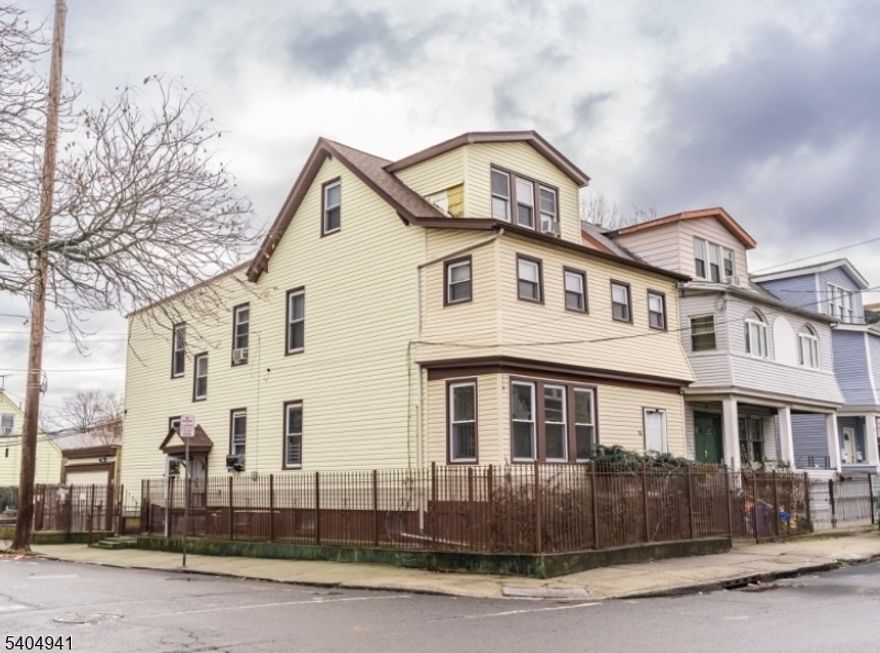 Well-maintained two-family property featuring two separate apartments, each offering 3 bedrooms and 1 full bathroom with spacious layouts. The property also includes a bonus attic space with a bathroom, plus an additional bathroom in the basement for added convenience. Perfect opportunity for first-time home buyers looking to take advantage of CRA and low-down-payment loan programs. Conveniently located near NJ Transit, the Garden State Parkway, and major commuter routes to NYC, with easy access to schools, shopping, dining, and Newark's growing redevelopment areas   own for less than rent while building equity.