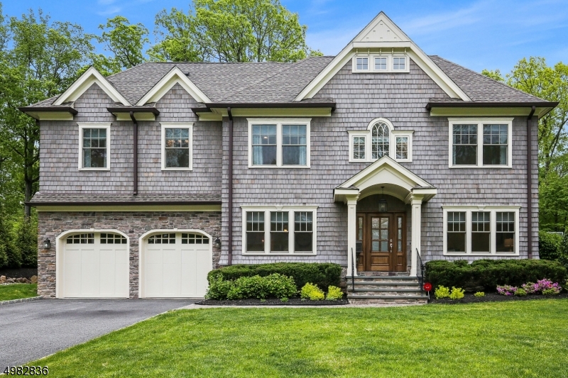 Stunning move-in ready  7BR, 6.1 BTH CH Col. resting on a large flat lot... perfect in every way! Upon entering this distinctive home, the tone is set right from the foyer. Gorgeous millwork, coffered