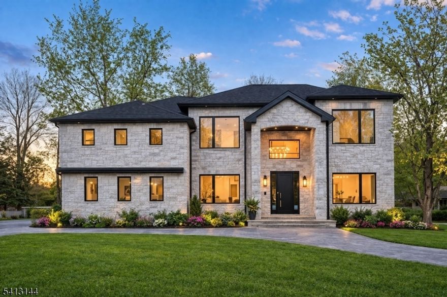 Stunning modern luxury residence featuring premium finishes and top-tier brands throughout. A grand circular driveway creates impressive curb appeal, complemented by elegant natural stone and architectural lighting.Inside, soaring ceilings and expansive Pella windows fill the home with natural light. The chef?s kitchen is equipped with Sub-Zero appliances, and high-end Moen plumbing fixtures are featured throughout. Fully integrated smart home system with security cameras and surround sound.Spray foam insulation ensures energy efficiency, while the all-weather deck and balcony, fully paved parking area and backyard, and custom blinds complete this exceptional offering.A rare blend of innovation, comfort, and refined design in Livingston.