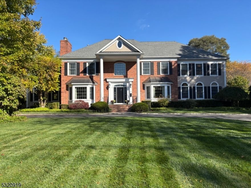Nestled on .86 acres in one of Livingston's most coveted areas, step into this exquisite 6 bedroom home with beautiful hardwood floors and custom moldings throughout. Sun drenched Chef's kitchen with two ovens, high end Viking Professional Series and Subzero appliances overlooking lush grounds.