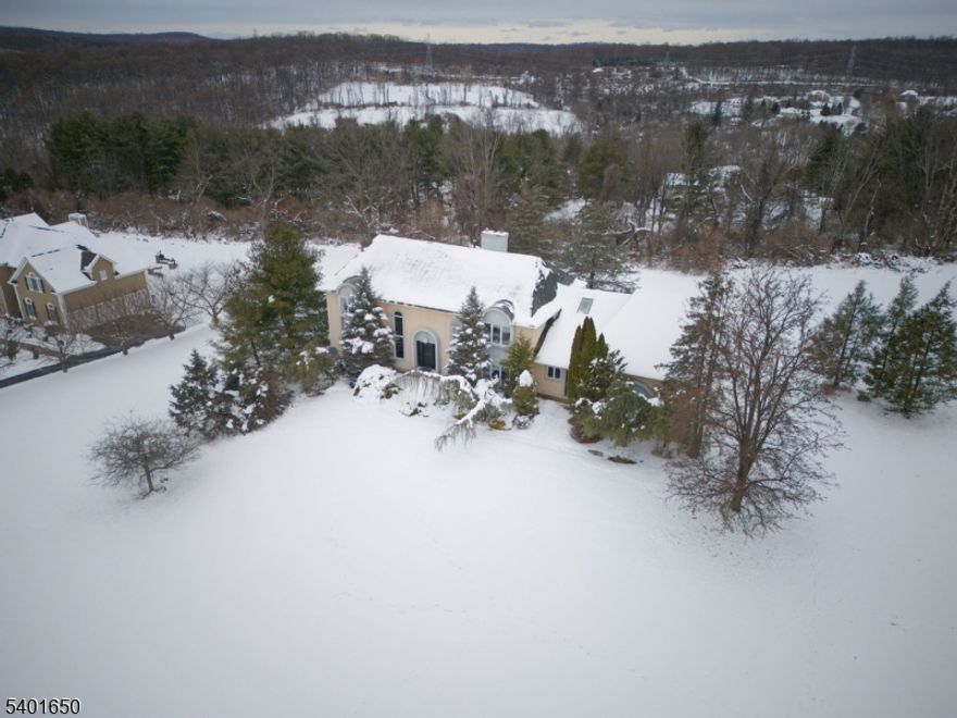 FANTASTIC OPPORTUNITY to bring this home back to it's original glory. 4 bedrooms, 3 full baths & 2 half baths. Enter the foyer to a butterfly staircase, flanked by the Dining Room & Living Room. The large kitchen is open to the family room (w/fireplace) adjacent to a dedicated office. The laundry room and 2 half baths complete this main level. Upstairs the Primary suite has a fireplace and spacious bath area and huge closet possibilities. There is also a princess suite upstairs as well as 2 additional bedrooms with a shared bath. This home is being sold STRICTLY AS-IS. SELLERS/TRUST WILL MAKE NO REPAIRS, REPLACEMENTS, OR CREDITS FOR INSPECTION ISSUES. This includes but is not limited to mold remediation, septic, well, radon, chimneys, appliances, structure, and roof. Buyer responsible for all state and local inspections and CO's. Buyer also responsible for disposal of all personal items left in home.