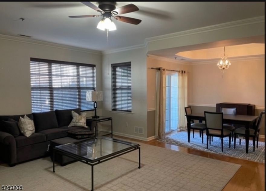 Excellent opportunity to live at the desirable Morris Place community. This 2 bedrooms, 2 1/2 bathrooms, features an open floor plan, hardwood floors, stainless steel appliances, granite counter tops, laundry room, nice balcony overlooking the courtyard and walkout to a private patio.  The primary bathroom has double sinks, jetted tub and stall shower. Great location! Minutes away to the Midtown Direct Train to NYC, less than 1 mile to Morristown Medical Center and close to the Mayo Performing Arts Center, The Morristown Green, Restaurants, Shopping, Grocery stores and Walking Paths. Easy access to Routes 287, 80, and 24. No Pets.  No Smoking.
