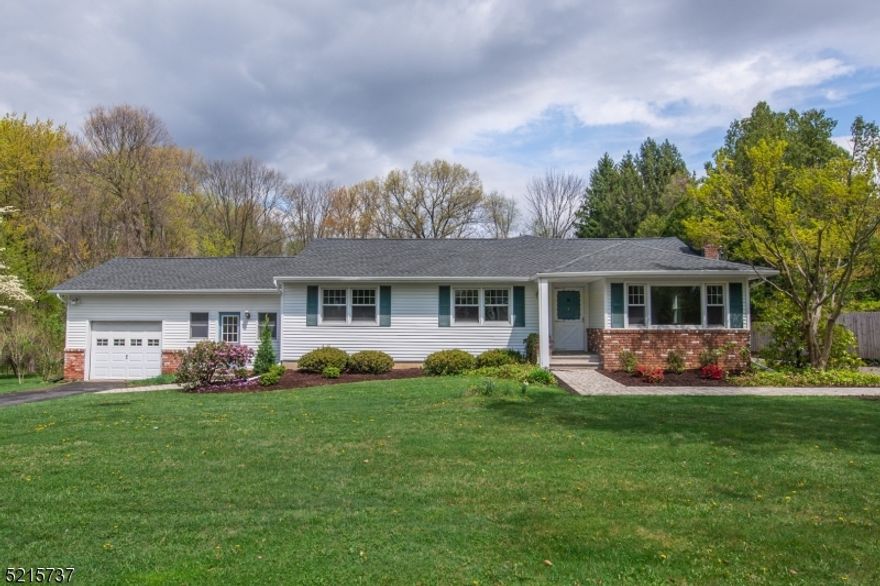 Beautiful, Sprawling, Updated Ranch. Fabulous Open Living Space with an Eat-In-Kitchen with gorgeous Cherry Wood cabinets, an abundance of counter space, Granite Counters & SS Appliances. Bright, Sunny family room off the  kitchen that makes this space an entertainer's dream. Living room with fireplace & HW throughout the house.  Main hall bath features a jacuzzi tub & shower. 3 bedrooms with an additional full bath. Flexible finished basement that could be used for a Family room and/or game room. There is also a separate room set up presently as an exercise room. Laundry and a good-sized storage room complete the finished basement. Convenient to everything!  Close by to public transportation -NYC-Direct train & bus, major highways, grocery store & great restaurants/shopping in Downtown Denville.