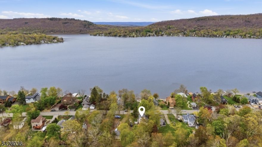 In the heart of CULVER LAKE, this beautifully updated lake home is more than a place it's a lifestyle rooted in community and connection. Wake up to stunning LAKE VIEWS and enjoy the ease of being just STEPS AWAY FROM THE WATER. Inside, the updated kitchen and spacious layout including 4 bedrooms plus a den offer room to grow, gather, and make lasting memories. A 2014 addition added three bedrooms and a full bath, creating flexible living for today's needs. Outside, a fenced yard and barn(equipped with electric) bring charm and functionality and a front porch to take in those beautiful views. With key updates already in place, this home is ready for its next chapter whether it's your everyday retreat or weekend escape.  New hot water heater in 2024, pellet stove that heats the whole house, foam insulation, shiplap to prevent drafts from the wind, captains window in upstairs bedroom and new septic in 2014 are just a few more perks!  Short distance to the club house for activities and beach! Access the lake directly across from your front yard for fishing, boating, swimming! Furniture can be included with the sale of the home minus a few select pieces the seller is taking with them.