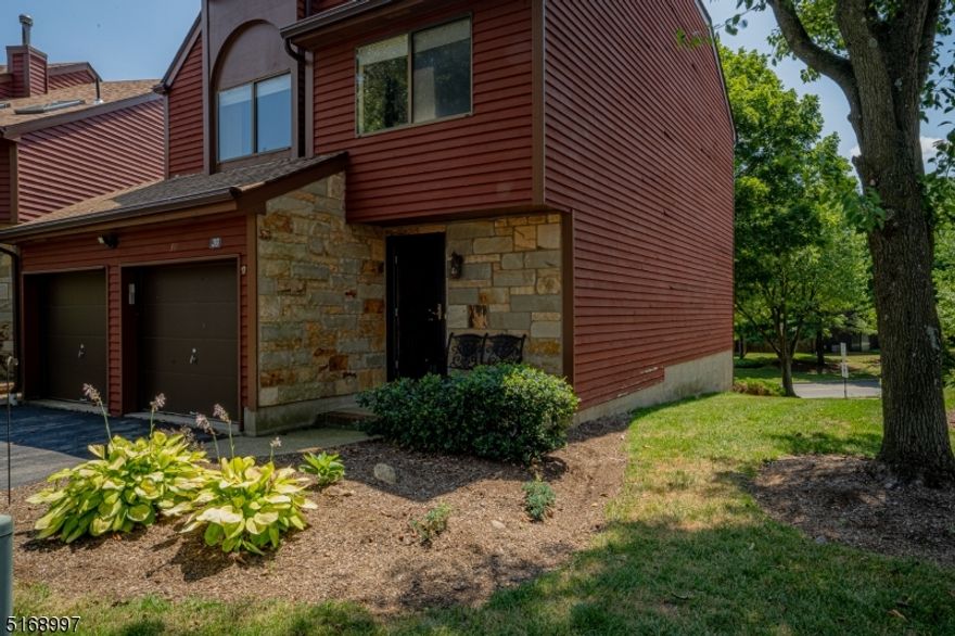 This three story stand alone unit is tucked right into the end corner of a cul-de-sac. Its first floor offers a large warm living room attached to a dining room, hardwood flooring, updated kitchen, granite countertops, gas cooktop range, and a floating island. The second floor offers three large bedrooms, walk-in closet, and two full bathrooms. Fully finished walk out basement with sliding door to patio. Central air throughout the house with newer boiler. Other features include large private deck, two-car garage, and ideally located additional parking. Amidites include community pool, playgrounds, and tennis courts. Property is located next to every shopping convinces you could need as well as major transportation routes.