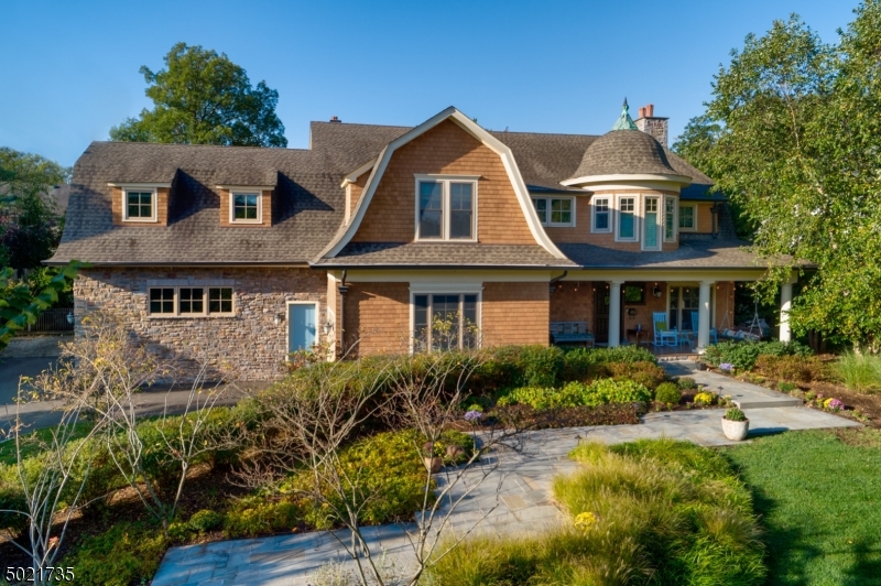 Nantucket meets Westfield! It doesn't get better than this stunning LEED certified 6 BD, 4.5 BA custom New England shingle style home located in the heart of sought after Indian Forest neighborhood! Architect/Designer's hm & it shows! Stunning architectural details & high-end design! Fab fp & stunning prop w/breathtaking gardens which encase extraordinary outdoor entertaining spaces. High ceilings & gorg moldings t/o, amazing Gour Chef's Kitch w/top of the line EVERYTHING. Eleg Liv & Din Rms. Amazing Study w/fp for working from home. Stellar Fam Rm w/coffered ceiling & fp. MBR Suite w/fp, HUGE w/in clst & lux spa-like BA. Other beds on 2nd lvl w/on-trend BAs (1 ensuite, 1 Jack/Jill). Teen Rec Rm/Lounge on 2nd lvl. Incredible LL Rec Rm, Custom Wet Bar, Home Theatre, 2 BDS, fab Laun Rm & fantastic Full BA!
