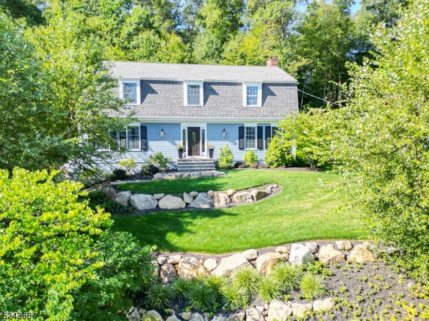 WELCOME HOME TO THIS MODERN AND IMMACULATE 4 BEDROOM 2.1 BATH COLONIAL IN THE HIGHLY DESIRABLE BURNHAM PARK SECTION OF MORRISTOWN. THE CHEF'S KITCHEN IS A DREAM WITH CHERRY CABINETS, GRANITE COUNTERS, VIKING REFRIGERATOR, WOLF DUEL FUEL 6 BURNER CENTER GRILL DOUBLE OVEN, CENTER ISLAND, FARMHOUSE SINK, AND WINE REFRIGERATOR. BEAUTIFUL HARDWOOD FLOORS THROUGHOUT THE FIRST FLOOR, CARPET (OVER HARDWOOD) ON THE SECOND FLOOR. THE PRIMARY EN SUITE FEATURES HUGE WALK IN CLOSET AND FULL BATH WITH STALL SHOWER.  ALL BATHROOMS HAVE BEEN UPGRADED AND FEATURE NATURAL STONE AND MARBLE. LAUNDRY ROOM ON 2ND FLOOR! THE FAMILY ROOM, FEATURING WOOD BURNING FIREPLACE HAS SLIDERS THAT OPEN UP TO THE ENTERTAINING-SIZED PATIO. NEW FLOORING IN FINISHED BASEMENT, WITH WALK-OUT TO GARAGE. NEW INTERIOR DOORS, CROWN MOLDINGS THROUGHOUT.  NEW GARAGE DOORS, WATER SOFTENER & UNDERGROUND IRRIGATION SYSTEM.  NEW PROPERTY RETAINING WALLS AND TOTAL RENOVATION OF LANDSCAPING. THIS HOME IS A MUST SEE!!  CONVENIENT LOCATION--CLOSE TO THE MORRISTOWN GREEN AND NYC TRAINS. *SELLER IS PURCHASING A ONE YEAR HOME WARRANTY AT CLOSING FOR THE BUYER FOR ADDITIONAL PEACE OF MIND!