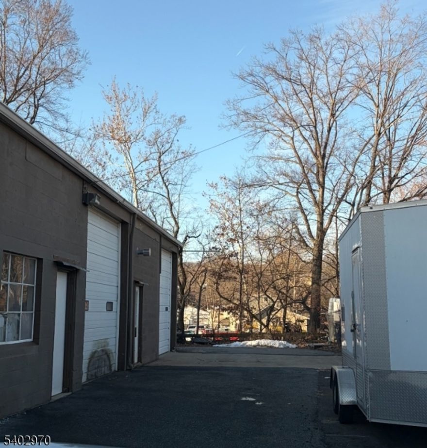 LEASE THIS UNIT! Excellent location off of Hamburg Tpke, close to Highways. Rear unit with 2 overhead 12 x 12 doors with an existing lift (as is condition) Unit is heated and has one office, one bathroom and a large workshop. Can be used for contractor, woodwork, car repair shop etc. Parking is indoors and outdoors. Available immediately.