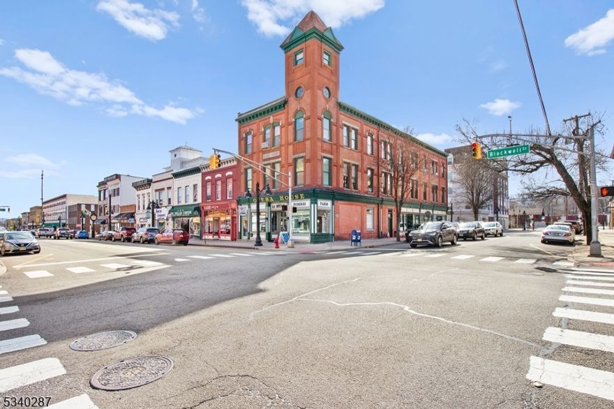 Seize the opportunity to own a landmark in the heart of Dover's thriving downtown The historic Baker Building. This iconic property offers exceptional potential for both investors & businesses alike. With its rich history & prime location, the Building stands as a unique asset in one of New Jersey's sought-after commercial districts. Key Features include: PRIME LOCATION - Situated minutes from the Dover Train Station, this property offers unmatched accessibility for tenants & clients, placing you at the center of a bustling, dynamic community; SPACIOUS LOT - The large corner lot provides ample visibility & foot traffic, enhancing the building's appeal; AMPLE PARKING - Featuring 20 private parking spaces, this property addresses the growing demand for convenient, off-street parking in a downtown area; RENTAL INCOME POTENTIAL - 12 rental units almost fully leased, the Baker Building offers a reliable income stream from day one; HISTORIC CHARM - This distinctive, well-maintained building retains its original architectural charm, offering a unique blend of historic character & modern amenities. Whether you're looking for a high-demand retail space, office suites, or a mix of both, the Baker Building presents an exciting investment opportunity in a vibrant & evolving downtown market. Don't miss out on this rare chance to own a piece of Dover's history with incredible upside potential.