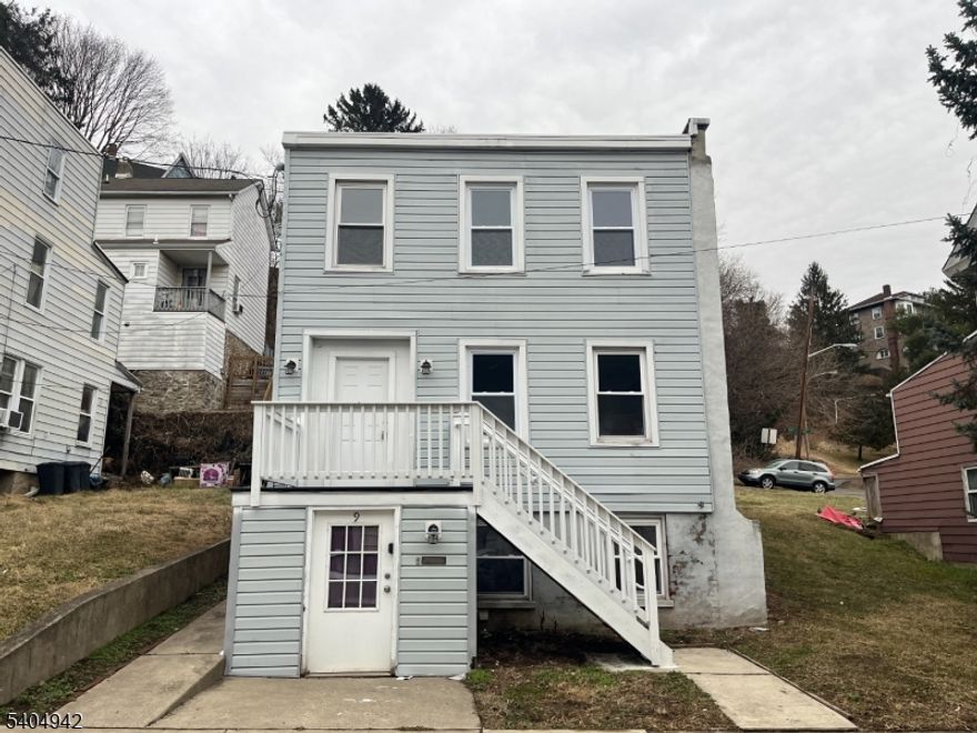 Renovated 2 bedroom with a bonus room upstairs! Vinyl flooring throughout, newer appliances, newer bathroom. Public utilities! Washer and Dryer in unit. Available for immediate occupancy. BRING YOUR PETS!!