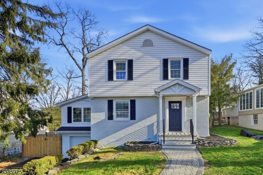 Welcome to this beautifully renovated 4-bedroom, 4.5-bath Colonial set in Livingston's highly sought-after Collins neighborhood. Completely updated in 2025, with all new electrical, HVAC Plumbing  and several new windows, this home offers modern comfort and peace of mind throughout.The spacious open-concept main level features a bright living/ Family room with a wood-burning fireplace and an open dining area with sliders to a  large deck overlooking the private backyard ideal for entertaining. A stunning designer kitchen outfitted with stainless steel appliances and shaker cabinetry. The first floor also includes a convenient Office/ bedroom with an en suite full bath, plus an additional powder room.Upstairs, you'll find three generously sized bedrooms, including a serene primary suite with double closets and a newly finished spa-like bathroom.A fully finished basement adds even more versatility, featuring a recreation area and a multipurpose room-perfect for guests, a home office, or a playroom and a full bath.Additional highlights include an attached garage, fully fenced yard, and expansive deck offering the perfect outdoor retreat. Situated in a prime location close to top-rated schools, Cooperman Barnabas Hospital (less than a mile away), transportation, major highways, shopping, and more.