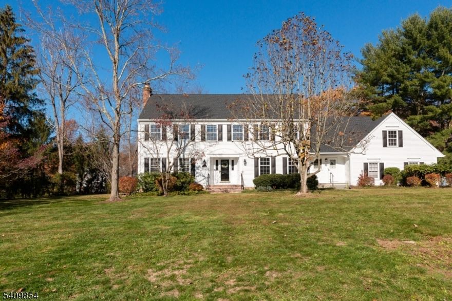 Nestled in one of Basking Ridge's most coveted neighborhoods, this classic Center Hall Colonial offers timeless elegance paired with everyday comfort. From the moment you enter, hardwood floors set a warm and welcoming tone throughout much of the home. The thoughtfully designed layout features gracious formal living and dining rooms and a newly updated kitchen ideal for hosting gatherings, while the family room with one of the two wood-burning fireplaces, provides the perfect space to unwind. Outdoors, a private, fenced backyard creates your own retreat. Whether you're entertaining on the deck, relaxing in the charming gazebo, or enjoying summer days by the in-ground pool, this home is designed to make the most of indoor-outdoor living. It's suited for quiet evenings at home or lively celebrations. Adding to its appeal is an unbeatable location just minutes from top-rated Basking Ridge schools, major commuter highways, and train stations offering effortless access to work, shopping, and dining. This exceptional property delivers the perfect balance of elegance, comfort, and convenience in one of New Jersey's most desirable communities. Landlord requires a 700 credit score minimum.